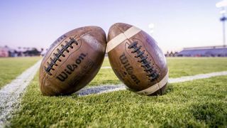 High school football coach finds out he's been fired by reading the newspaper (Featured)
