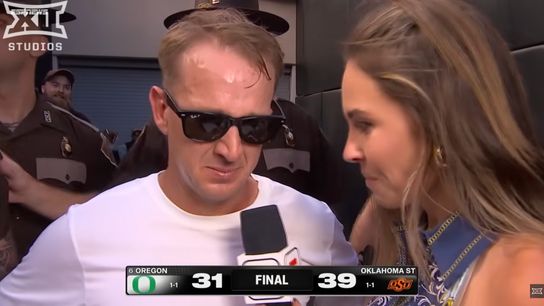Eric Morris near tears after Oklahoma State's stunning upset of No. 6 Oregon (Oklahoma State Football). Photo by ESPN